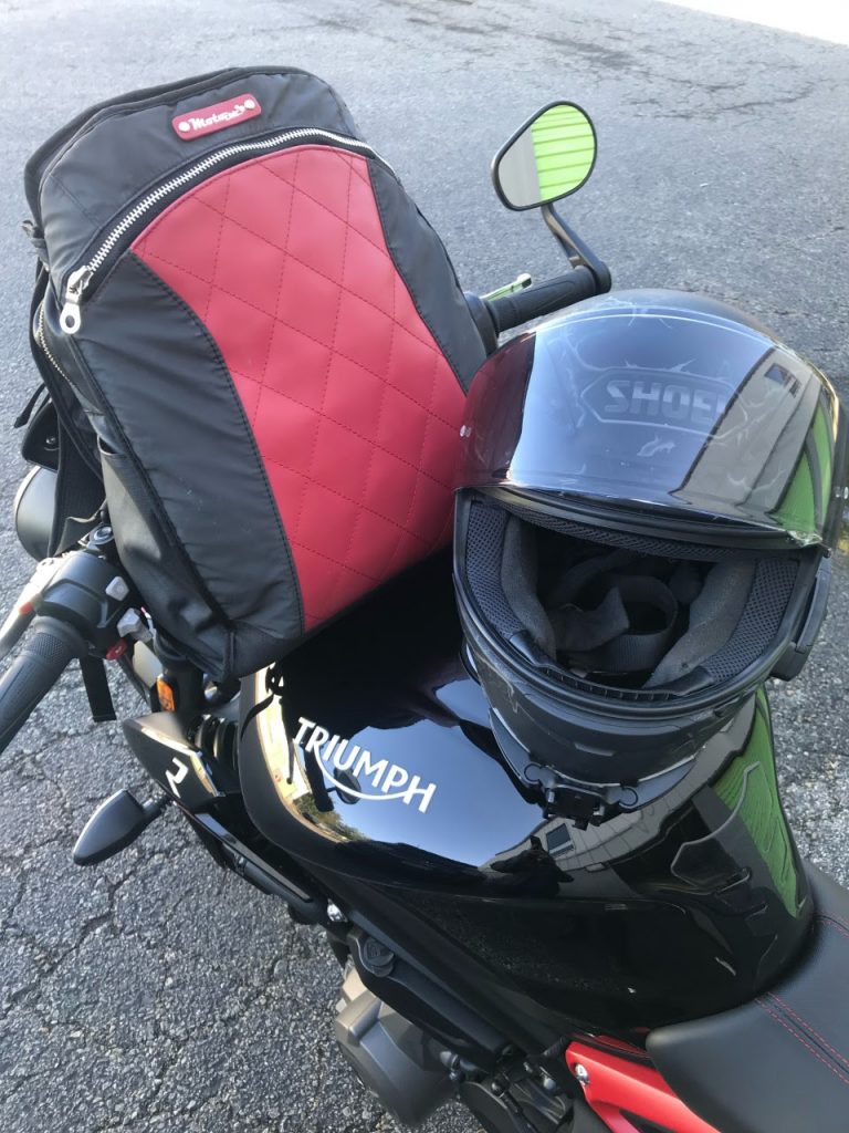 Lauren bag and helmet on motorcycle